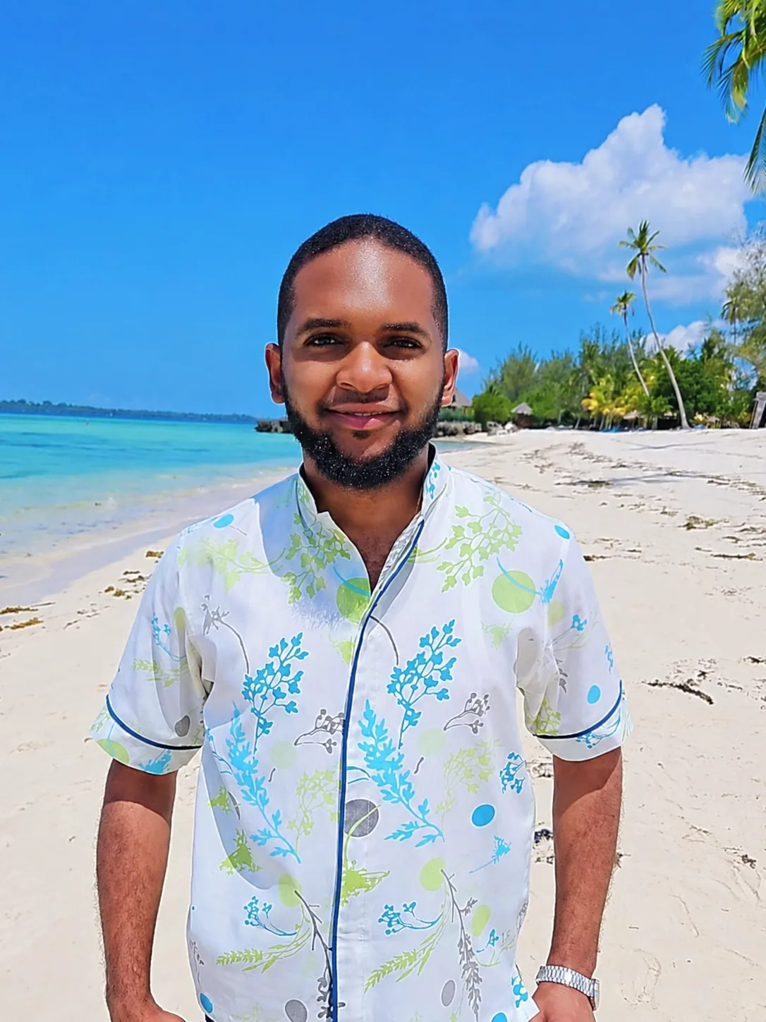 Adil Omar on the beach in Zanzibar